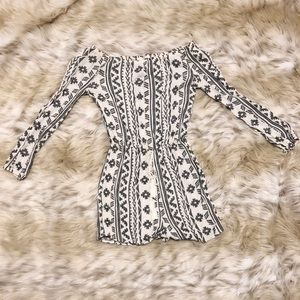 Off the shoulder tribal jumper with tie in front!